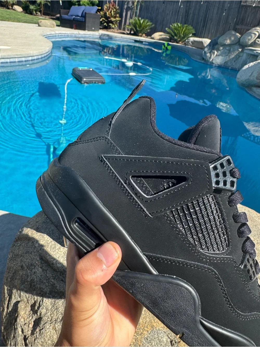 Jordan Men's Black Retro Sneakers with Subtle Red Accent